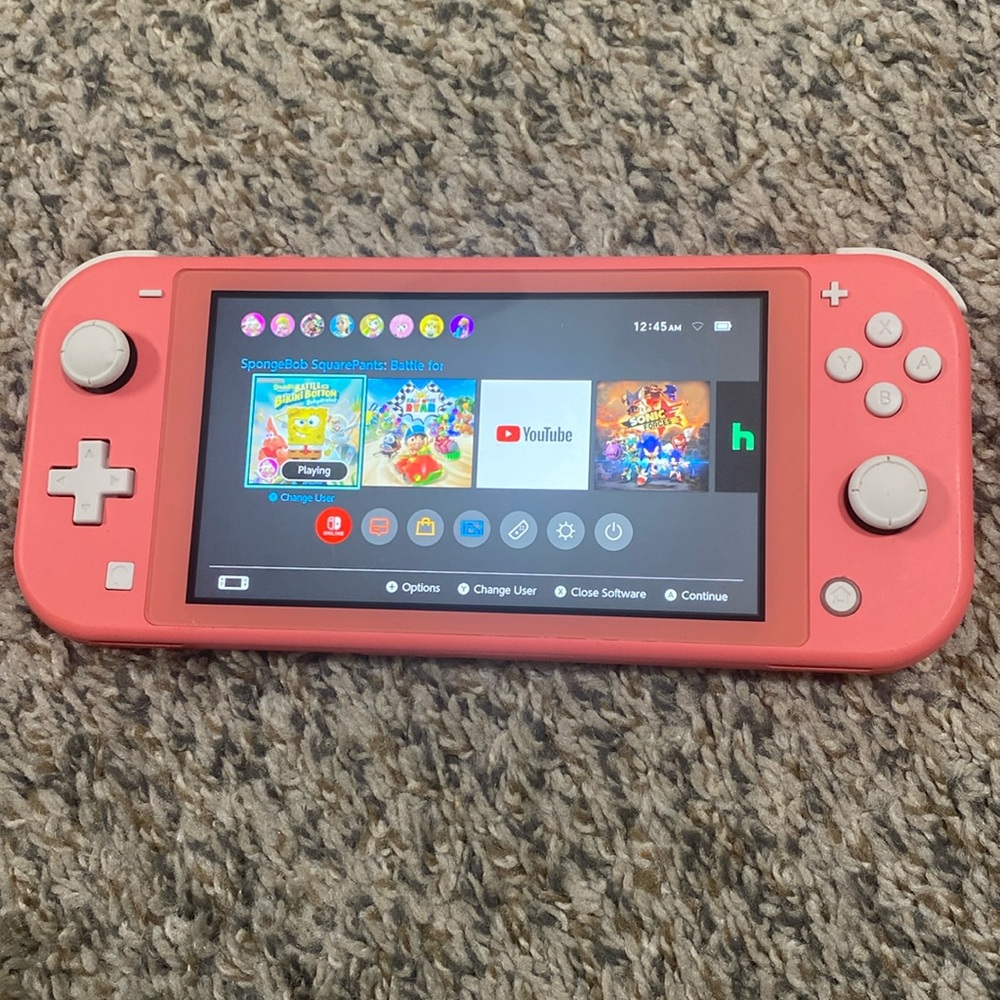 Nintendo Switch Lite- Coral Pink (with case)